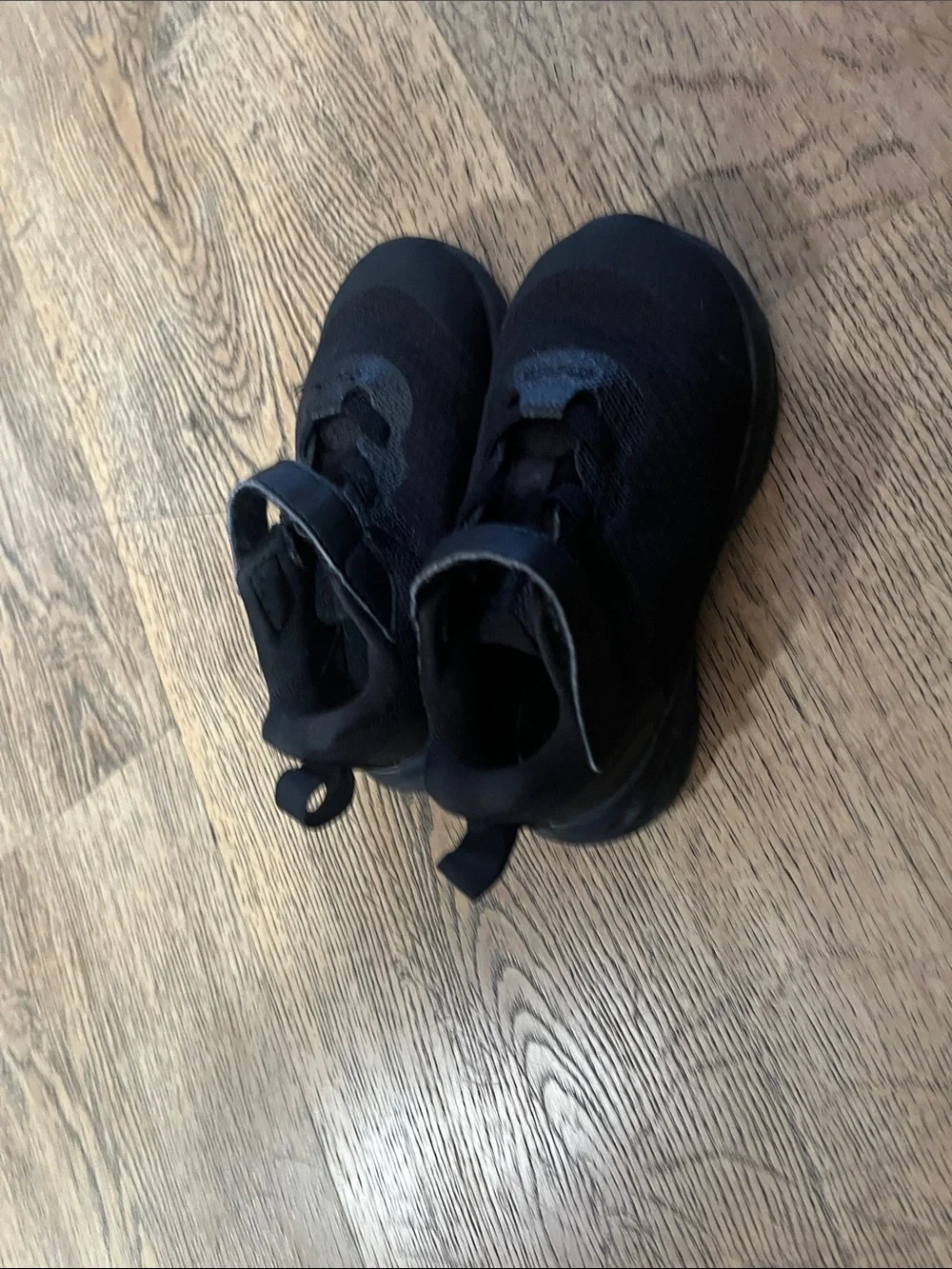 Black Nike kids shoes